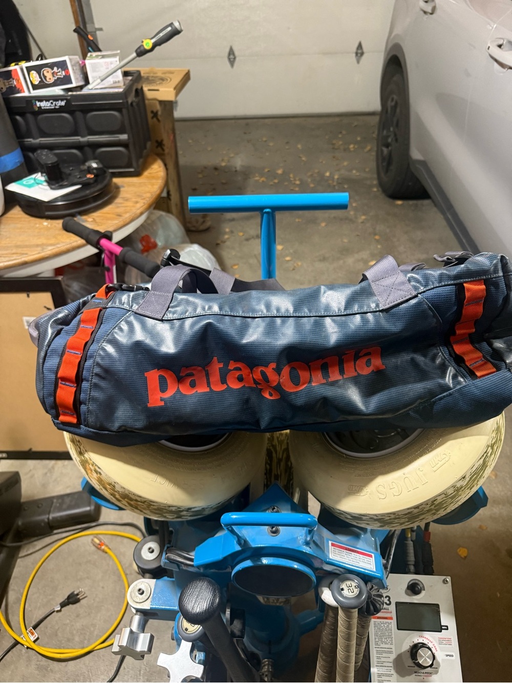 Patagonia Navy Duffel with Orange Logo and Straps